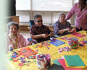 Photo of Forest Hills cargiver with residents